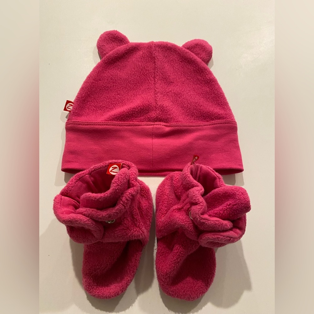 Pink hat and booties for baby